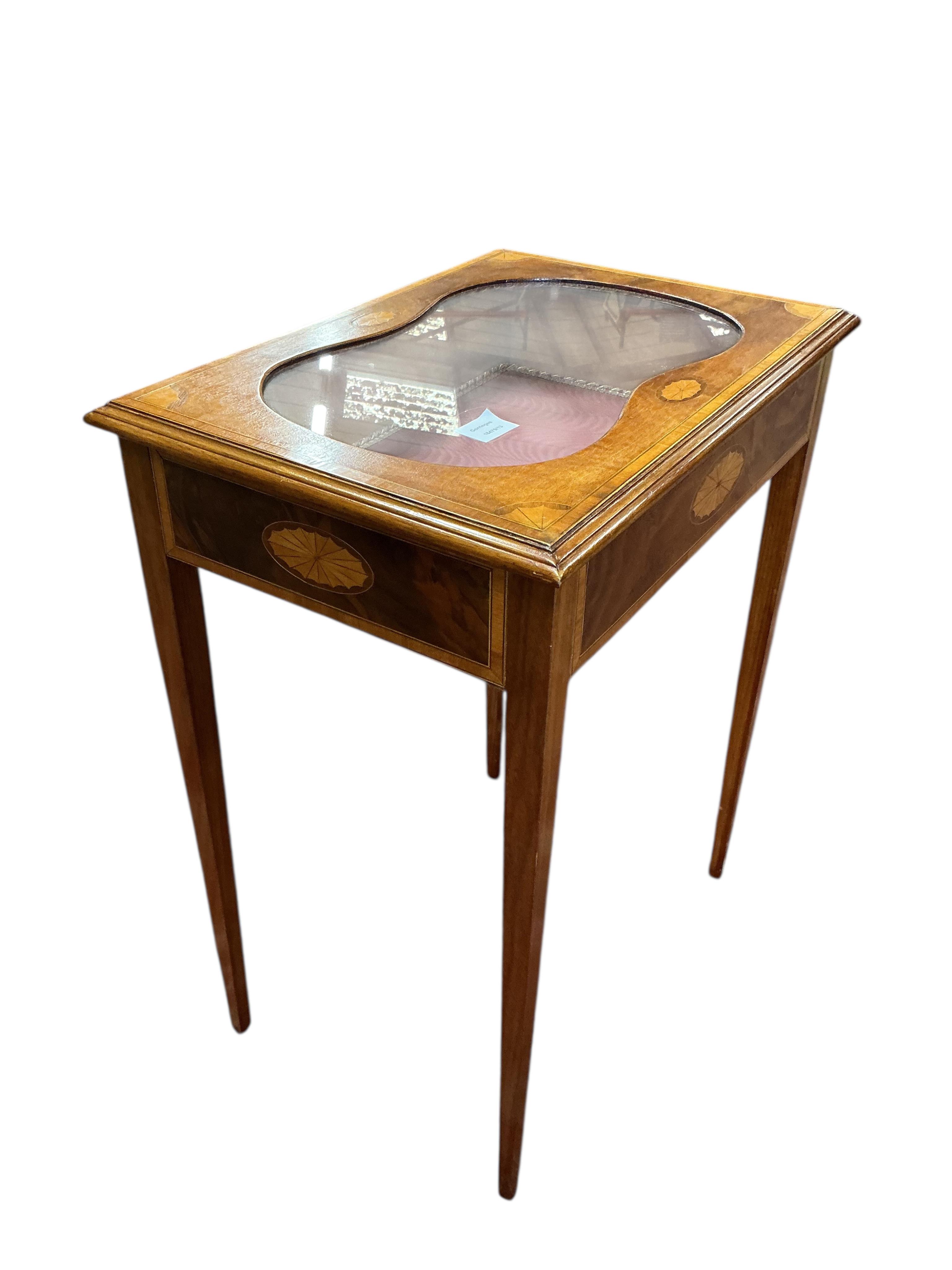 An Edwardian style inlaid mahogany bijouterie table, width 58cm, depth 41cm, height 76cm